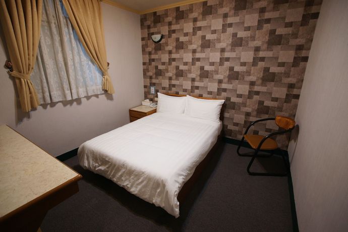 Imagen de la habitación del Hotel Rich Zone Hotel. Foto 12