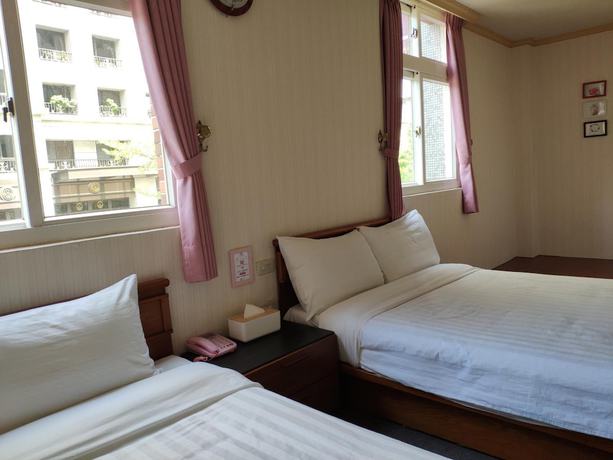 Imagen de la habitación del Hotel Rich Zone Hotel. Foto 17