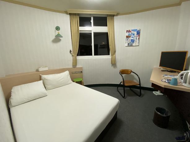 Imagen de la habitación del Hotel Rich Zone Hotel. Foto 18