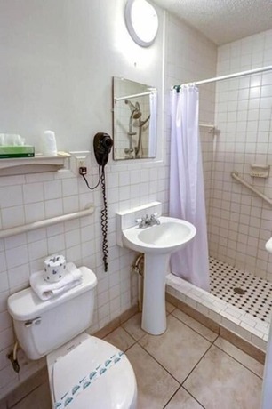 Imagen de la habitación del Hotel Richard\'s Motel Studio. Foto 18