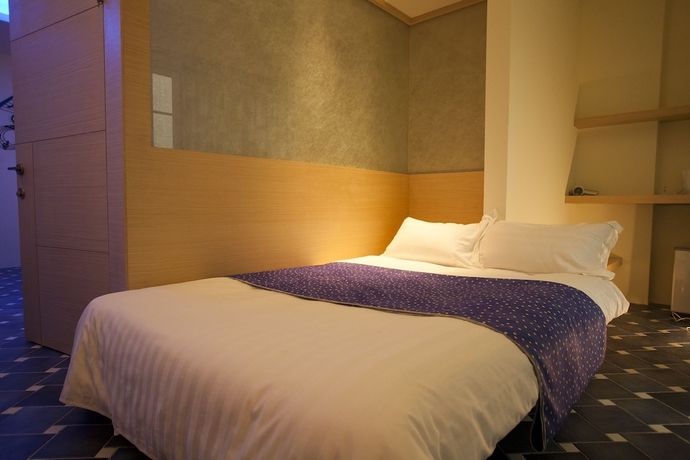 Imagen de la habitación del Hotel Richie BandB. Foto 13