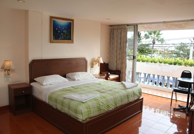 Imagen de la habitación del Hotel Richman Poorman Guesthouse. Foto 6