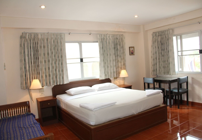 Imagen de la habitación del Hotel Richman Poorman Guesthouse. Foto 7