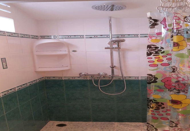 Imagen de la habitación del Hotel Richman Poorman Guesthouse. Foto 8