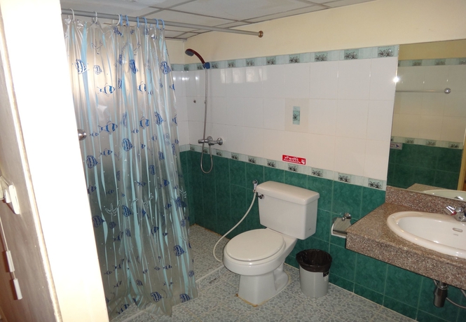 Imagen de la habitación del Hotel Richman Poorman Guesthouse. Foto 9