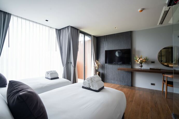 Imagen de la habitación del Hotel Richman Resort Hatyai. Foto 19