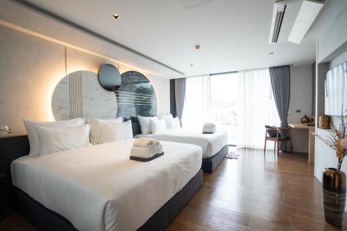 Imagen de la habitación del Hotel Richmann Resort Hatyai. Foto 18