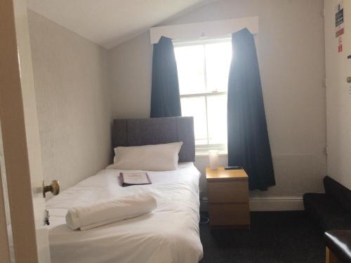 Imagen de la habitación del Hotel Richmond House. Foto 9