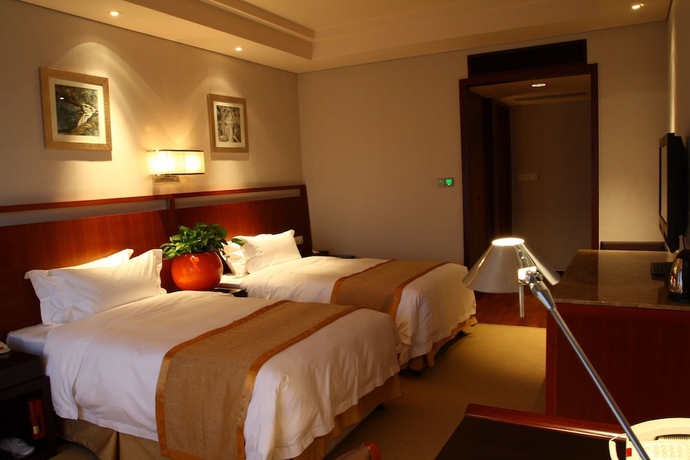 Imagen de la habitación del Hotel Richview Tianjin. Foto 10
