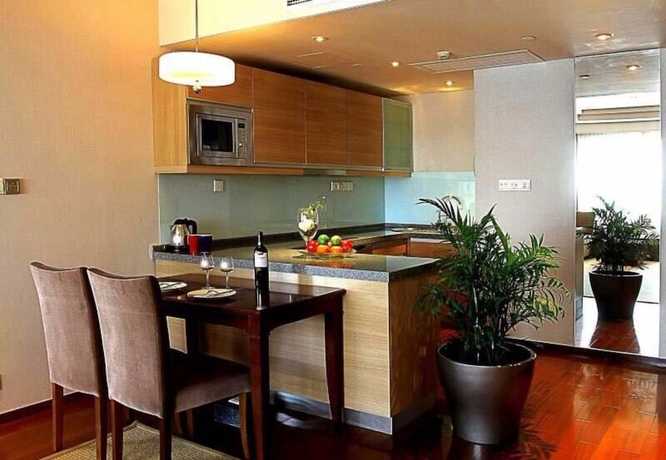 Imagen de la habitación del Hotel Richview Tianjin. Foto 11