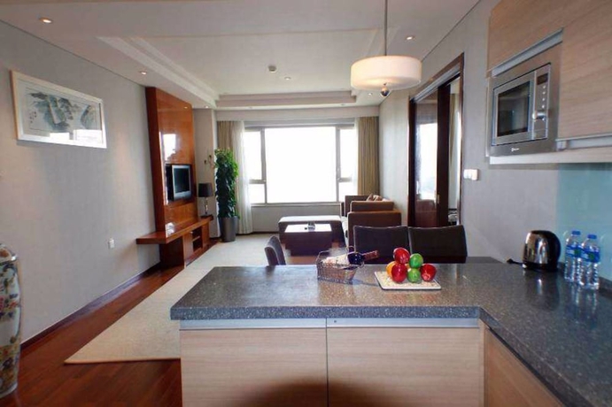 Imagen de la habitación del Hotel Richview Tianjin. Foto 12