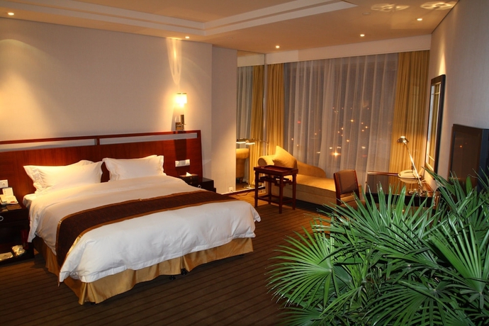 Imagen de la habitación del Hotel Richview Tianjin. Foto 15