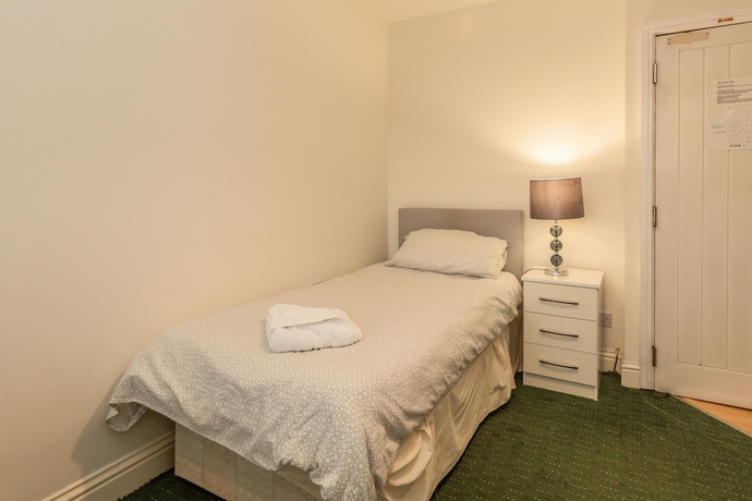 Imagen de la habitación del Hotel Ricky Road Guest House. Foto 2
