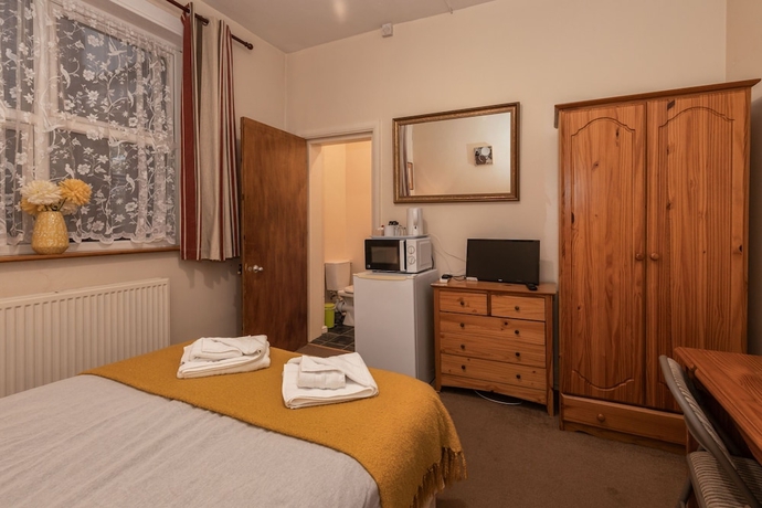 Imagen de la habitación del Hotel Ricky Road Guest House. Foto 6