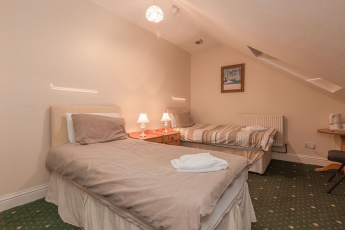 Imagen de la habitación del Hotel Ricky Road Guest House. Foto 7