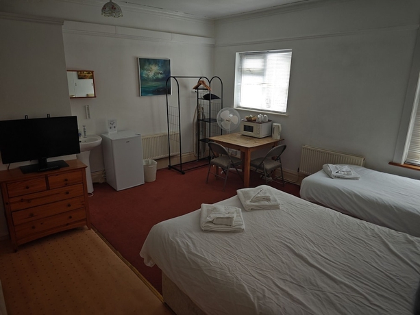 Imagen de la habitación del Hotel Ricky Road Guest House. Foto 10