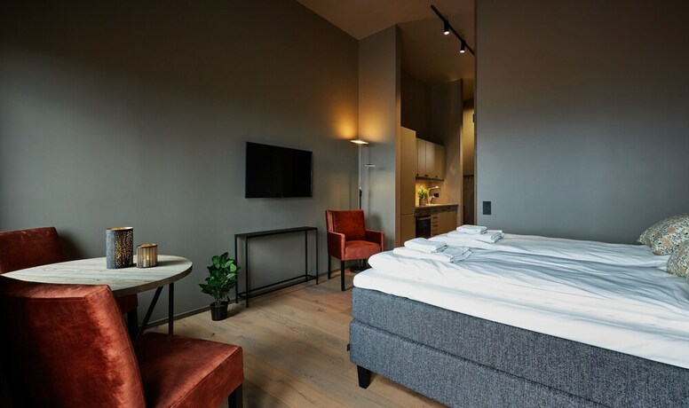 Imagen de la habitación del Hotel Riddergaarden. Foto 20