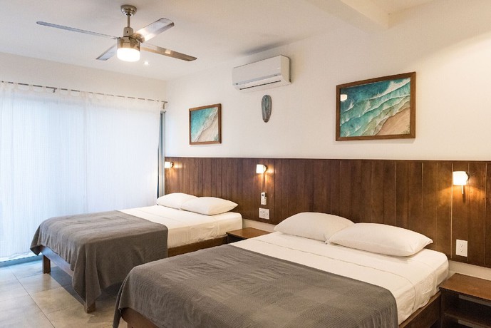 Imagen de la habitación del Hotel RideOn Beach House. Foto 7