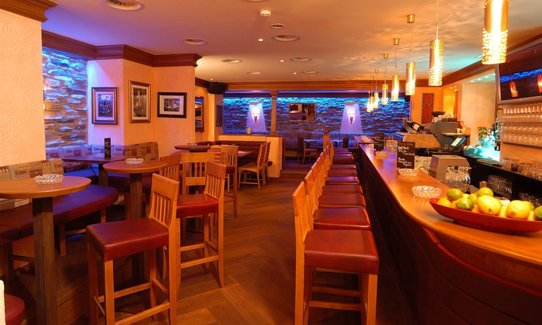 Imagen del bar/restaurante del Hotel Riders In. Foto 8
