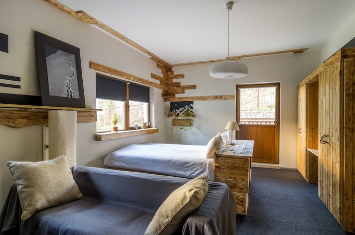 Imagen de la habitación del Hotel Riders Lodge. Foto 13