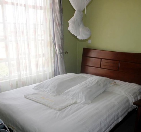 Imagen de la habitación del Hotel Ridge Apartments. Foto 19