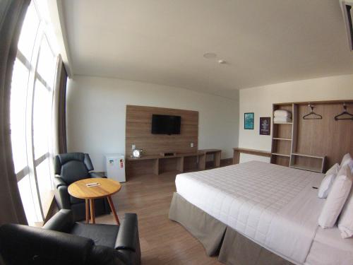 Imagen de la habitación del Hotel Riellis Center. Foto 7