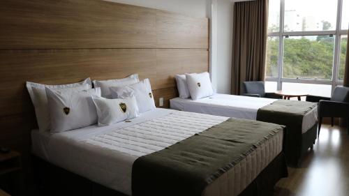 Imagen de la habitación del Hotel Riellis Center. Foto 8