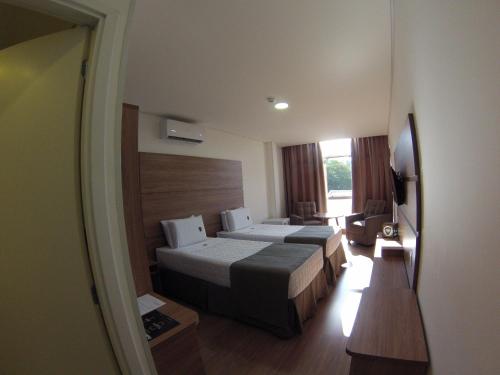 Imagen de la habitación del Hotel Riellis Center. Foto 9