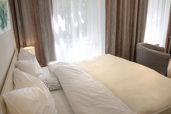 Imagen de la habitación del Hotel Riess City. Foto 11