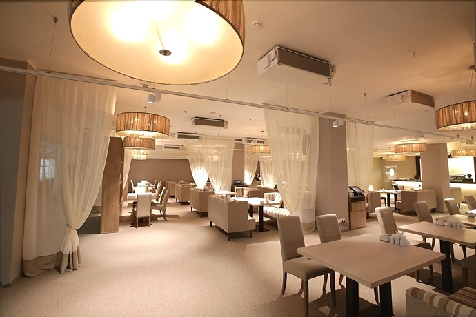 Imagen del bar/restaurante del Hotel Rigaland. Foto 3