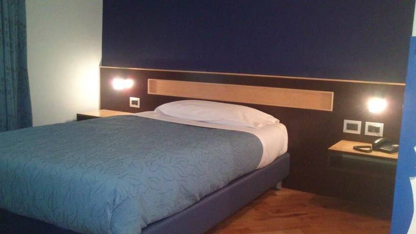 Imagen de la habitación del Hotel RigelHotel. Foto 14