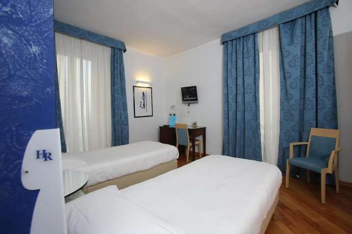 Imagen de la habitación del Hotel RigelHotel. Foto 15