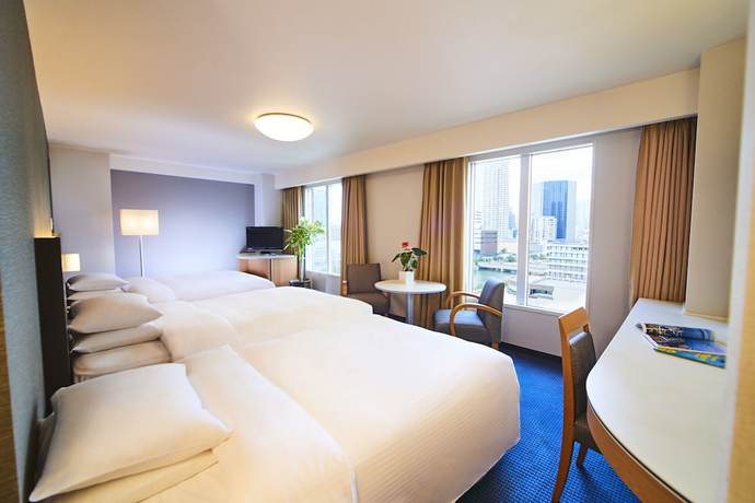 Imagen de la habitación del Hotel Rihga Royal Osaka. Foto 9