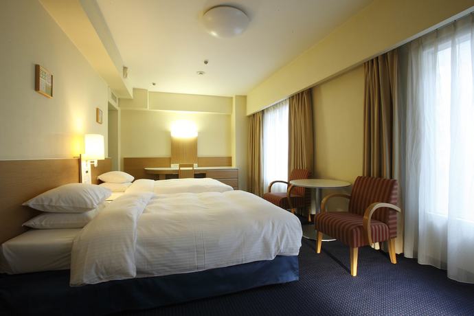 Imagen de la habitación del Hotel Rihga Royal Osaka. Foto 14