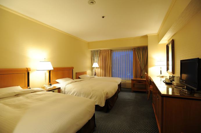 Imagen de la habitación del Hotel Rihga Royal Osaka. Foto 15