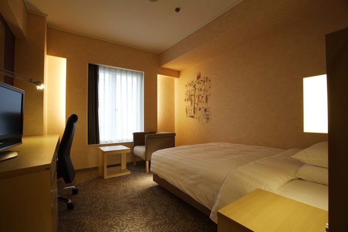 Imagen de la habitación del Hotel Rihga Royal Osaka. Foto 16
