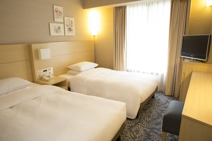 Imagen de la habitación del Hotel Rihga Royal Osaka. Foto 21