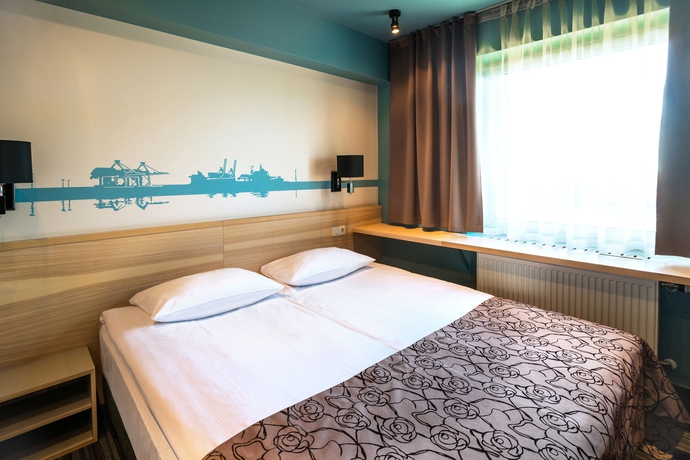 Imagen de la habitación del Hotel Rija Port Riga. Foto 10
