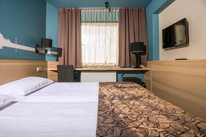 Imagen de la habitación del Hotel Rija Port Riga. Foto 11