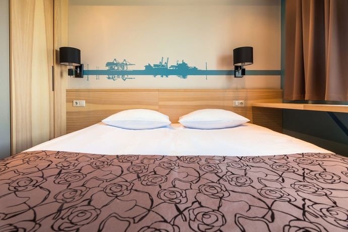Imagen de la habitación del Hotel Rija Port Riga. Foto 13