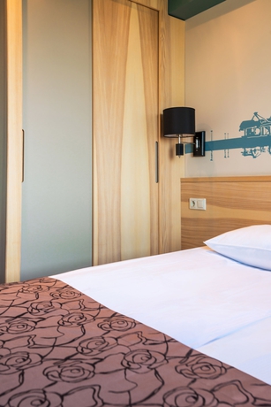 Imagen de la habitación del Hotel Rija Port Riga. Foto 15