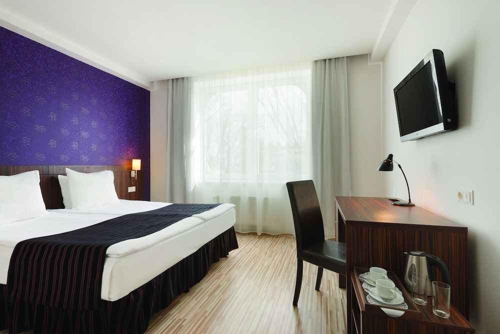 Imagen de la habitación del Hotel Rija Vef. Foto 1