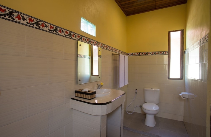 Imagen de la habitación del Hotel Rijet Villa Beach and Restaurant. Foto 11