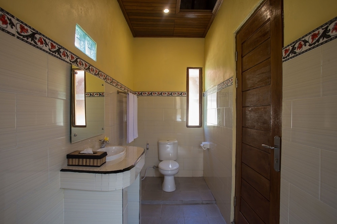 Imagen de la habitación del Hotel Rijet Villa Beach and Restaurant. Foto 14