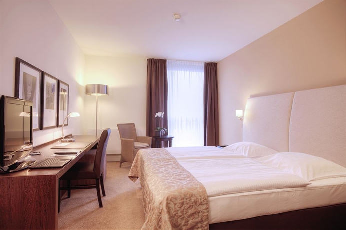 Imagen de la habitación del Hotel Rilano 24/7 München. Foto 7