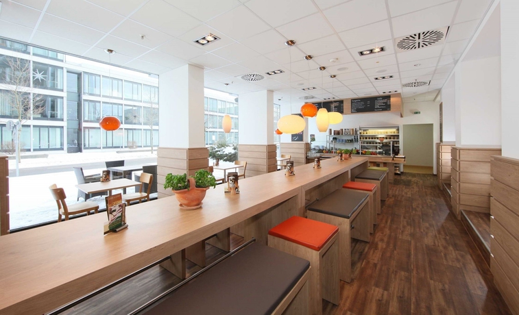 Imagen del bar/restaurante del Hotel Rilano 24/7 München. Foto 3