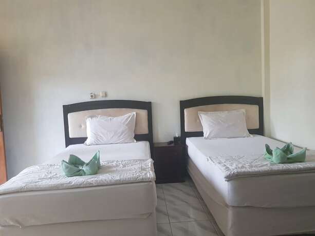 Imagen de la habitación del Hotel Rilo Homestay. Foto 14