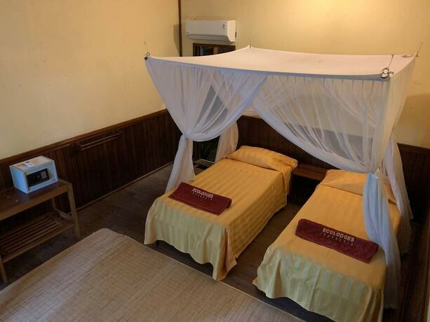 Imagen de la habitación del Hotel Rimba Orangutan Eco Lodge. Foto 19