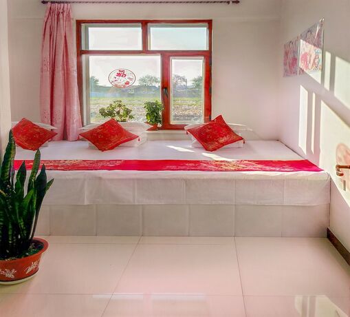 Imagen de la habitación del Hotel Rime Island Manzhaosongju Inn. Foto 15