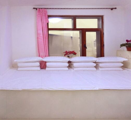 Imagen de la habitación del Hotel Rime Island Manzhaosongju Inn. Foto 17